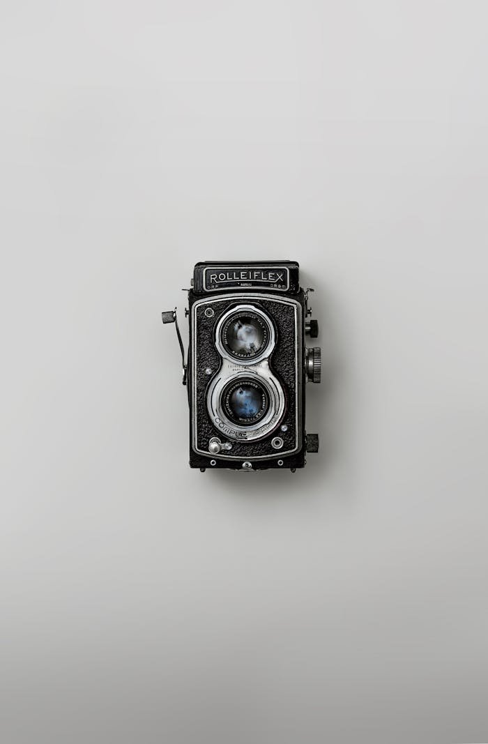 Mastering the First Impression: Your intriguing post title goes here Classic Rolleiflex camera showcased against a simple background, emphasizing nostalgia and vintage design.